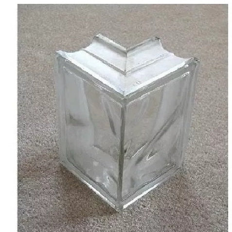Bloco de Vidro Canto para Acabamento Final 19x19x8cm Tradestar - Ideal para cantos de 90 graus, proporcionando um acabamento sofisticado em projetos de construção e design de interiores. Perfeito para divisórias, fachadas e áreas que necessitam de luz natural e privacidade.