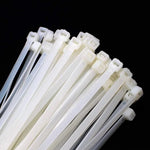 Abraçadeira de nylon preta Tradestar 3,6x150mm, pacote com 100 unidades, ideal para organizar e fixar cabos e fios em eletrônica, construção civil e automotivo.