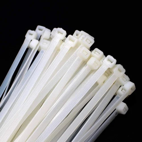 Abraçadeira de nylon preta Tradestar 3,6x150mm, pacote com 100 unidades, ideal para organizar e fixar cabos e fios em eletrônica, construção civil e automotivo.