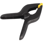 Grampo Multiuso 6 Pol 150MM Marceneiro Reforçado Tradestar em nylon preto com detalhes em amarelo, ideal para fixação em marcenaria, carpintaria e construção. Grampo de alta pressão para colagem e montagem de peças.