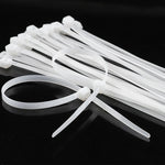 Abraçadeira de Nylon Enforca Gato 2,5x150mm Branca Tradestar com 500 unidades, ideal para organizar e fixar cabos e fios em eletrônica, construção, jardinagem e automotivo. Durável, versátil e fácil de usar.