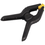 Kit com 10 Grampos Multiuso 3 Polegadas 75mm para Marceneiro Reforçado - Grampo de nylon preto com detalhes em amarelo, ideal para fixação em marcenaria e carpintaria. Inclui mola de alta pressão para fixação segura.